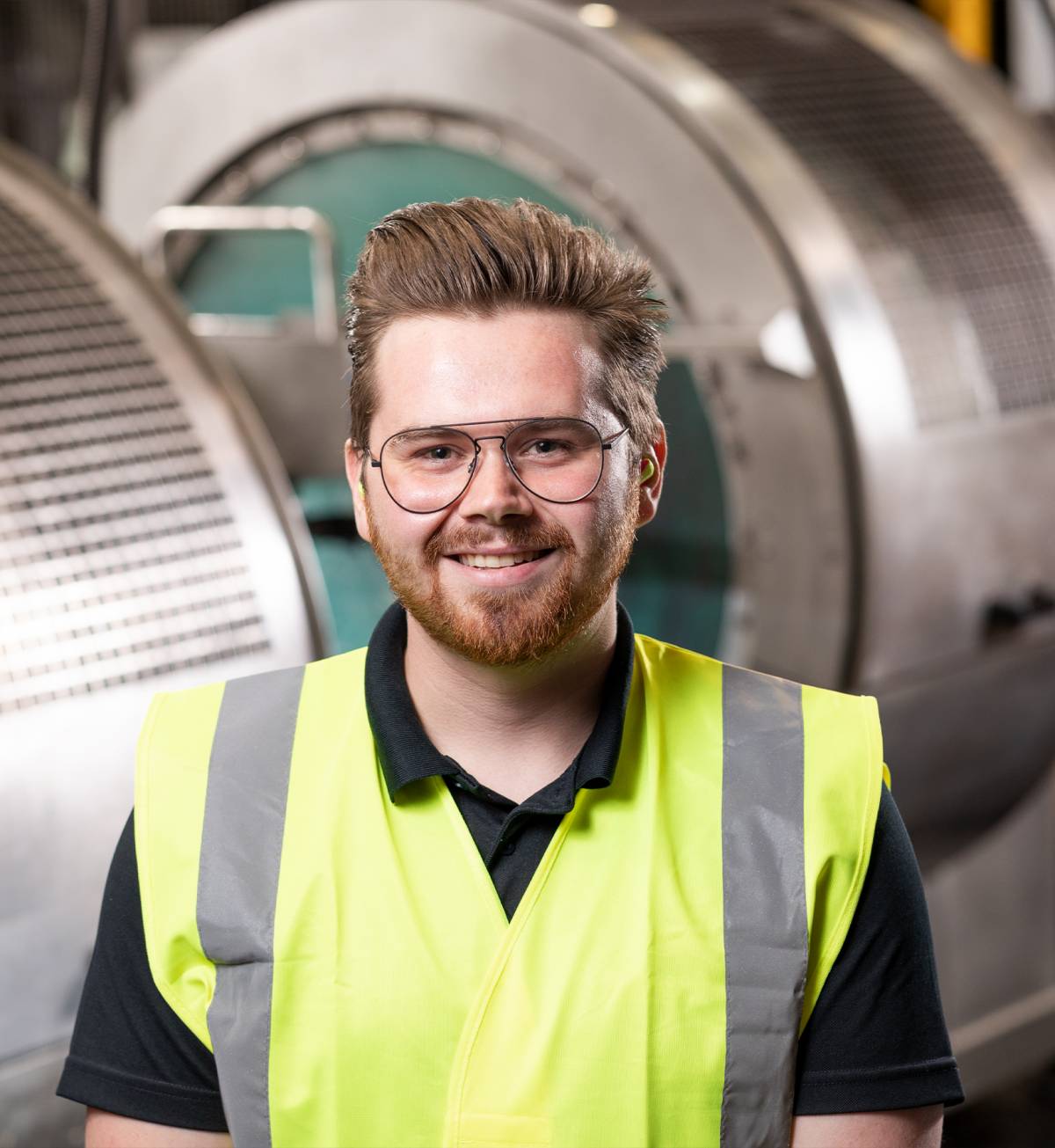 Young apprentice in factory space